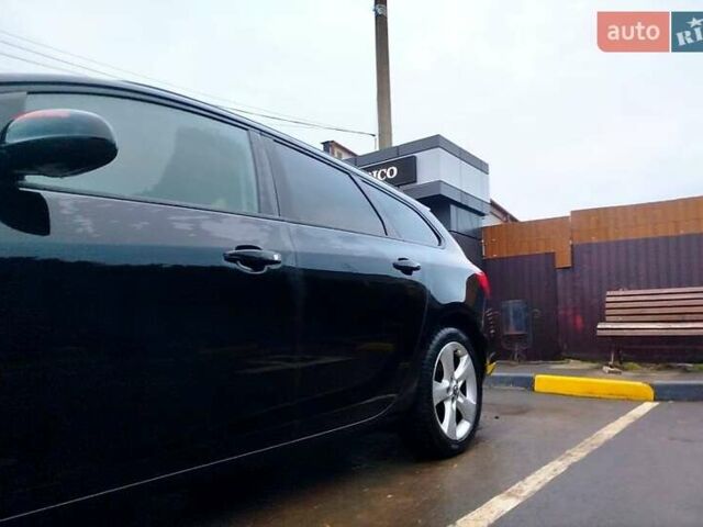Черный Опель Астра, объемом двигателя 1.4 л и пробегом 307 тыс. км за 6500 $, фото 4 на Automoto.ua