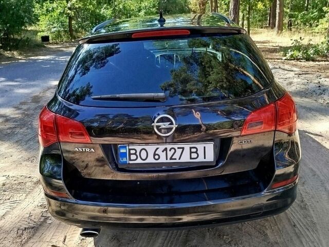 Черный Опель Астра, объемом двигателя 2 л и пробегом 287 тыс. км за 5650 $, фото 6 на Automoto.ua