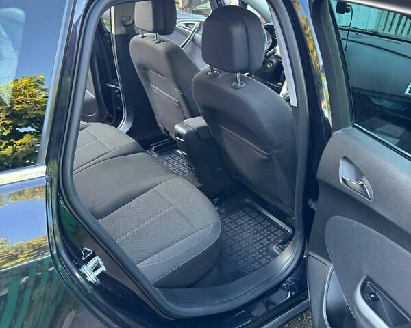 Чорний Опель Астра, об'ємом двигуна 1.6 л та пробігом 144 тис. км за 8300 $, фото 6 на Automoto.ua