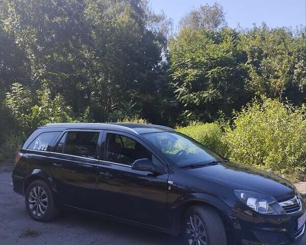 Чорний Опель Астра, об'ємом двигуна 1.8 л та пробігом 140 тис. км за 7300 $, фото 6 на Automoto.ua