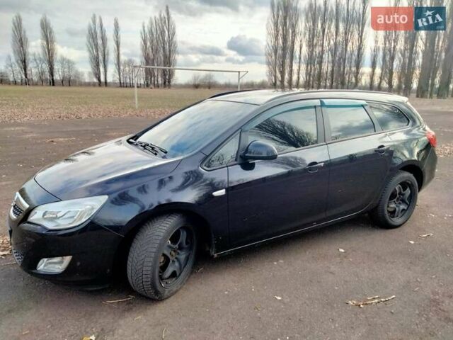 Черный Опель Астра, объемом двигателя 1.7 л и пробегом 270 тыс. км за 7000 $, фото 15 на Automoto.ua