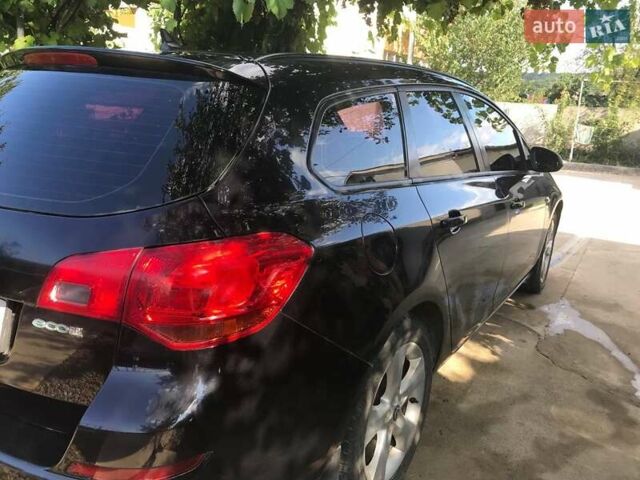 Опель Астра 2011 у Ямпіль на Automoto.ua Чорний Опель Астра, об'ємом двигуна 1.25 л та пробігом 255 тис. км за 5300 $, фото 4 на Automoto.ua