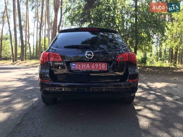 Черный Опель Астра, объемом двигателя 1.6 л и пробегом 239 тыс. км за 6950 $, фото 6 на Automoto.ua
