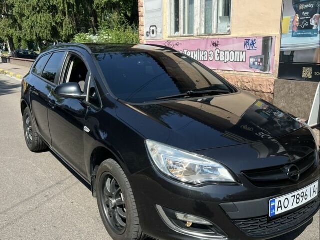 Черный Опель Астра, объемом двигателя 1.7 л и пробегом 350 тыс. км за 5200 $, фото 1 на Automoto.ua