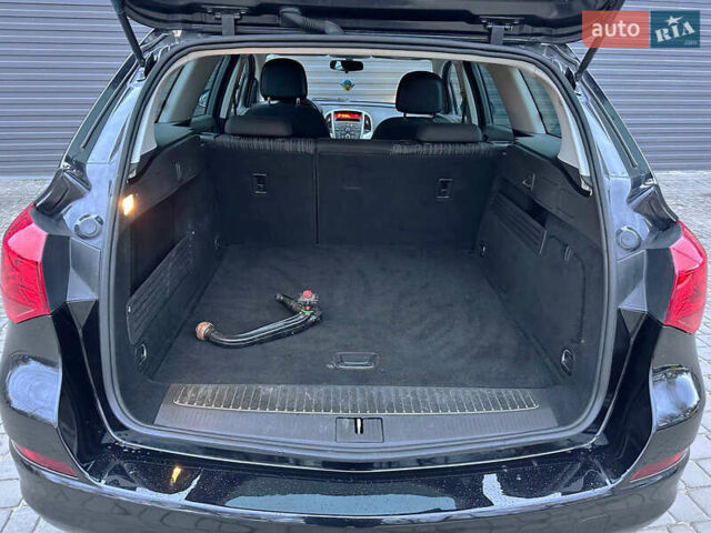 Черный Опель Астра, объемом двигателя 1.4 л и пробегом 180 тыс. км за 7500 $, фото 7 на Automoto.ua