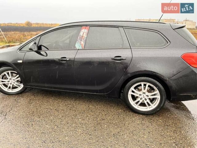 Черный Опель Астра, объемом двигателя 1.7 л и пробегом 252 тыс. км за 6850 $, фото 7 на Automoto.ua