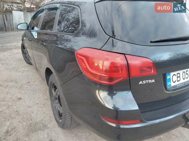 Черный Опель Астра, объемом двигателя 1.7 л и пробегом 270 тыс. км за 7000 $, фото 3 на Automoto.ua