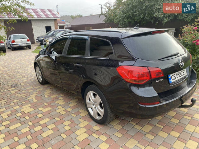 Черный Опель Астра, объемом двигателя 1.69 л и пробегом 280 тыс. км за 6700 $, фото 6 на Automoto.ua