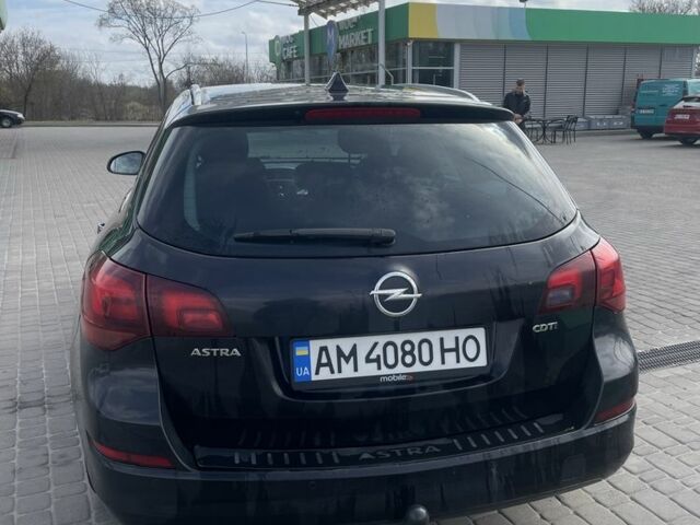 Черный Опель Астра, объемом двигателя 1.7 л и пробегом 245 тыс. км за 6900 $, фото 3 на Automoto.ua