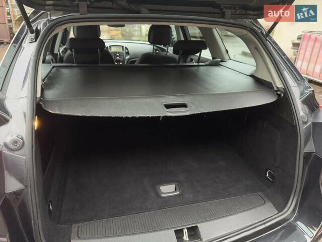 Черный Опель Астра, объемом двигателя 1.4 л и пробегом 225 тыс. км за 6350 $, фото 31 на Automoto.ua