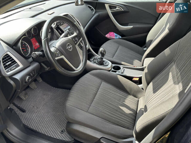 Чорний Опель Астра, об'ємом двигуна 1.25 л та пробігом 243 тис. км за 8150 $, фото 4 на Automoto.ua