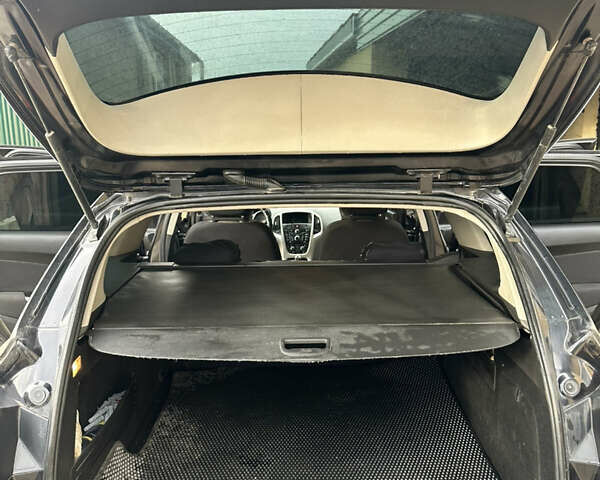 Черный Опель Астра, объемом двигателя 1.3 л и пробегом 264 тыс. км за 6500 $, фото 7 на Automoto.ua