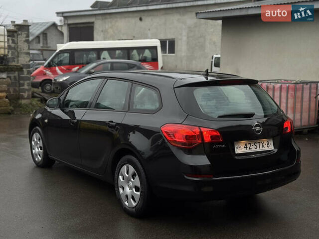 Черный Опель Астра, объемом двигателя 1.4 л и пробегом 225 тыс. км за 6350 $, фото 8 на Automoto.ua