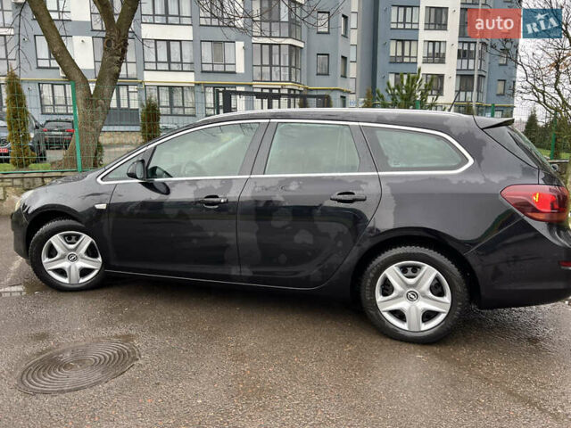 Черный Опель Астра, объемом двигателя 2 л и пробегом 247 тыс. км за 7350 $, фото 6 на Automoto.ua