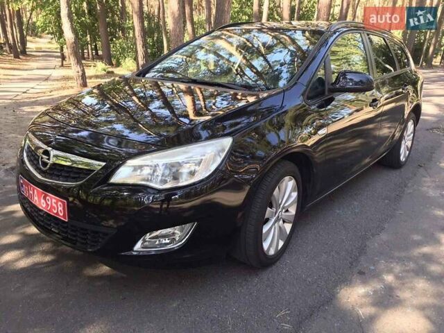 Черный Опель Астра, объемом двигателя 1.6 л и пробегом 239 тыс. км за 6950 $, фото 5 на Automoto.ua