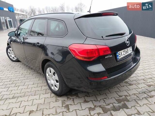 Черный Опель Астра, объемом двигателя 1.25 л и пробегом 1 тыс. км за 6200 $, фото 29 на Automoto.ua