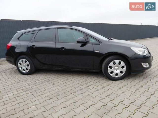 Черный Опель Астра, объемом двигателя 1.25 л и пробегом 1 тыс. км за 6200 $, фото 30 на Automoto.ua