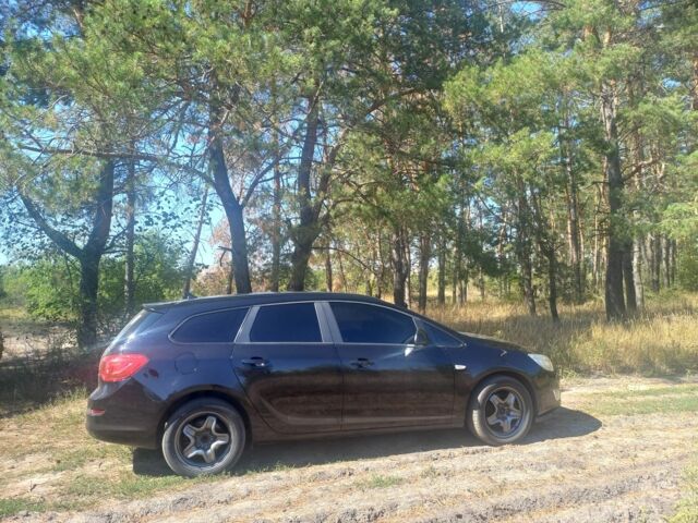 Черный Опель Астра, объемом двигателя 1.7 л и пробегом 278 тыс. км за 6950 $, фото 2 на Automoto.ua