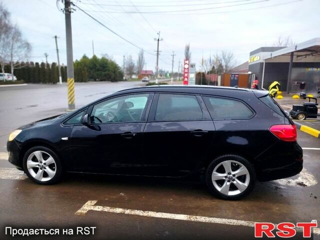 Черный Опель Астра, объемом двигателя 1.4 л и пробегом 307 тыс. км за 6500 $, фото 1 на Automoto.ua