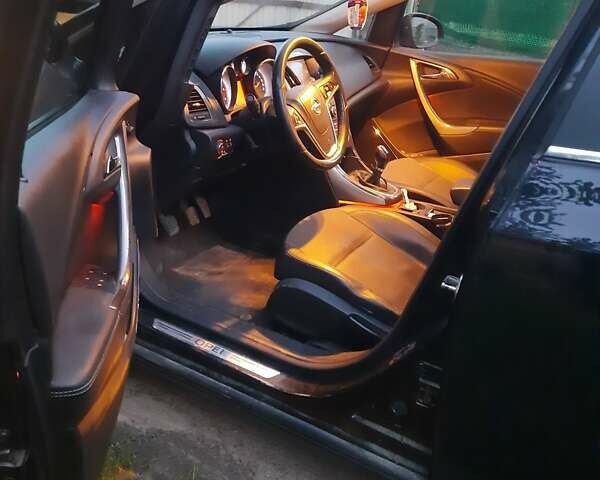 Черный Опель Астра, объемом двигателя 1.7 л и пробегом 287 тыс. км за 7400 $, фото 5 на Automoto.ua