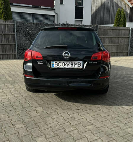 Черный Опель Астра, объемом двигателя 1.3 л и пробегом 226 тыс. км за 5500 $, фото 10 на Automoto.ua