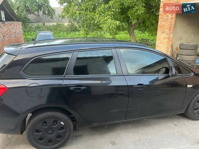 Черный Опель Астра, объемом двигателя 1.7 л и пробегом 231 тыс. км за 5800 $, фото 3 на Automoto.ua