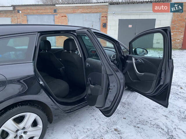 Черный Опель Астра, объемом двигателя 1.6 л и пробегом 230 тыс. км за 7300 $, фото 27 на Automoto.ua