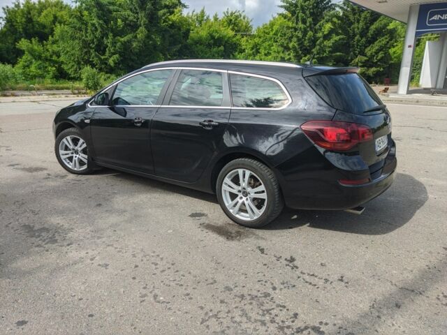 Черный Опель Астра, объемом двигателя 1.4 л и пробегом 209 тыс. км за 6700 $, фото 5 на Automoto.ua