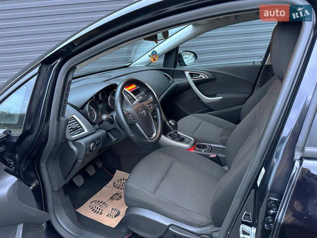Черный Опель Астра, объемом двигателя 1.4 л и пробегом 180 тыс. км за 7500 $, фото 4 на Automoto.ua