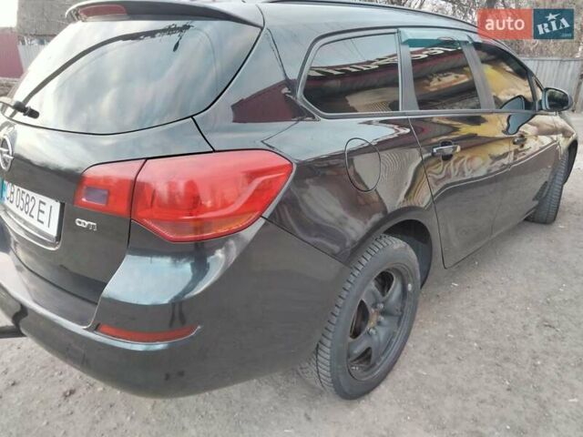 Черный Опель Астра, объемом двигателя 1.7 л и пробегом 270 тыс. км за 7000 $, фото 2 на Automoto.ua