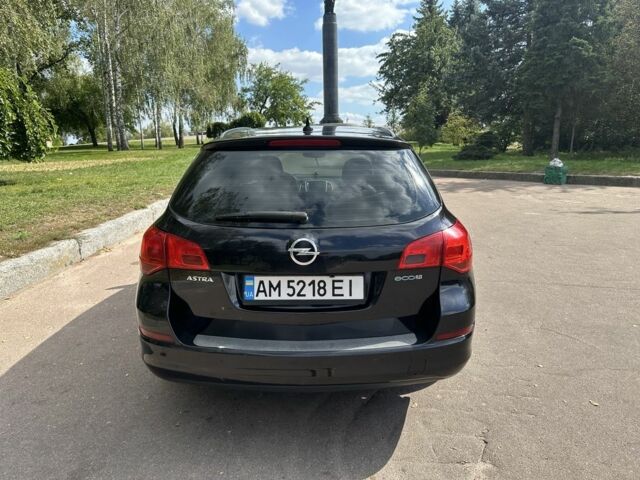 Черный Опель Астра, объемом двигателя 1.2 л и пробегом 345 тыс. км за 5950 $, фото 5 на Automoto.ua