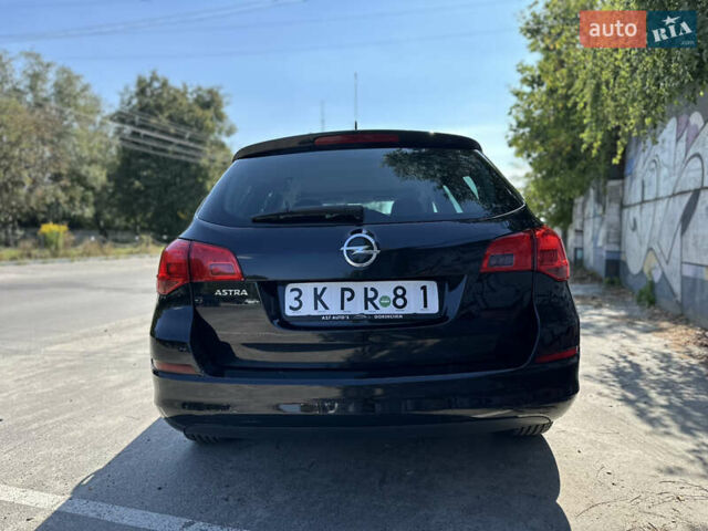 Черный Опель Астра, объемом двигателя 1.6 л и пробегом 238 тыс. км за 6500 $, фото 2 на Automoto.ua