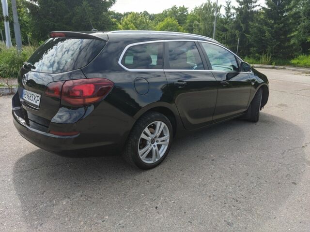 Черный Опель Астра, объемом двигателя 1.4 л и пробегом 209 тыс. км за 6700 $, фото 3 на Automoto.ua