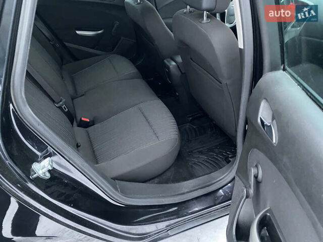 Черный Опель Астра, объемом двигателя 1.6 л и пробегом 230 тыс. км за 7300 $, фото 24 на Automoto.ua