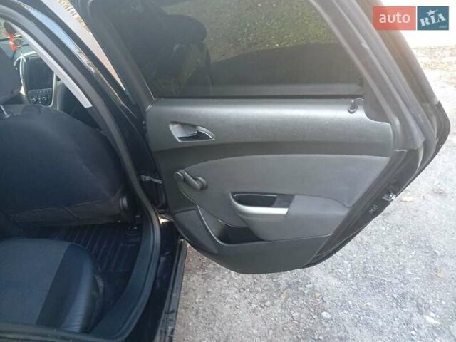 Черный Опель Астра, объемом двигателя 1.69 л и пробегом 309 тыс. км за 6300 $, фото 3 на Automoto.ua