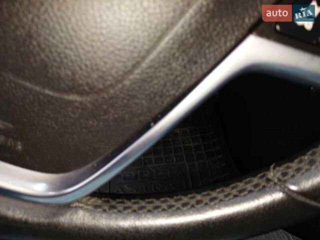 Черный Опель Астра, объемом двигателя 1.25 л и пробегом 1 тыс. км за 6200 $, фото 4 на Automoto.ua