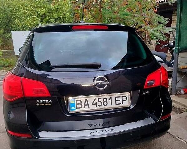 Черный Опель Астра, объемом двигателя 1.7 л и пробегом 202 тыс. км за 7000 $, фото 1 на Automoto.ua