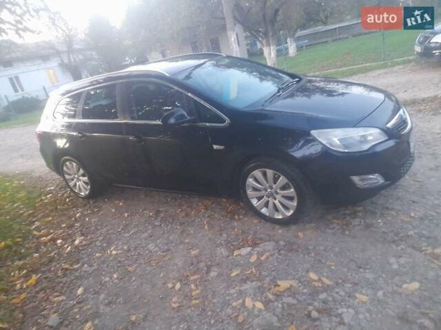 Чорний Опель Астра, об'ємом двигуна 1.2 л та пробігом 293 тис. км за 6950 $, фото 6 на Automoto.ua