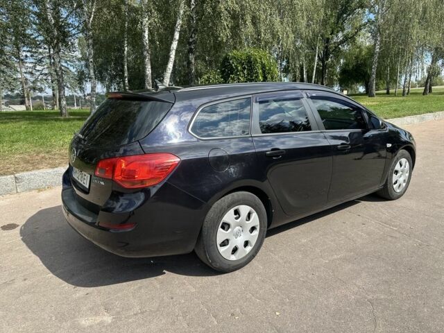 Черный Опель Астра, объемом двигателя 1.2 л и пробегом 345 тыс. км за 5950 $, фото 4 на Automoto.ua
