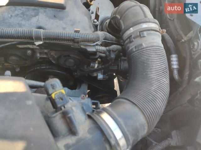 Черный Опель Астра, объемом двигателя 1.4 л и пробегом 229 тыс. км за 8760 $, фото 6 на Automoto.ua