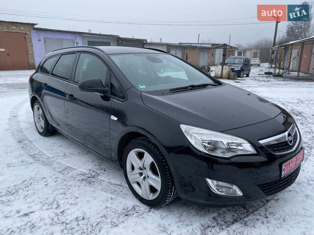 Черный Опель Астра, объемом двигателя 1.6 л и пробегом 230 тыс. км за 7300 $, фото 13 на Automoto.ua