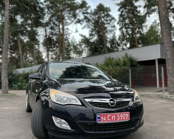 Черный Опель Астра, объемом двигателя 1.6 л и пробегом 182 тыс. км за 8100 $, фото 1 на Automoto.ua