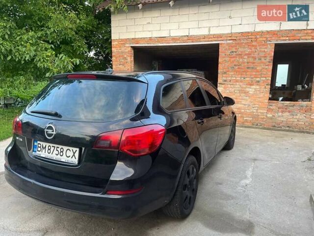 Черный Опель Астра, объемом двигателя 1.7 л и пробегом 231 тыс. км за 5800 $, фото 5 на Automoto.ua