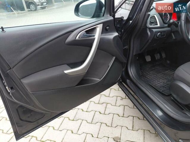 Черный Опель Астра, объемом двигателя 1.25 л и пробегом 1 тыс. км за 6200 $, фото 8 на Automoto.ua