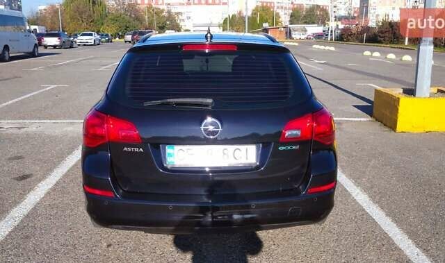 Черный Опель Астра, объемом двигателя 1.25 л и пробегом 300 тыс. км за 6500 $, фото 3 на Automoto.ua
