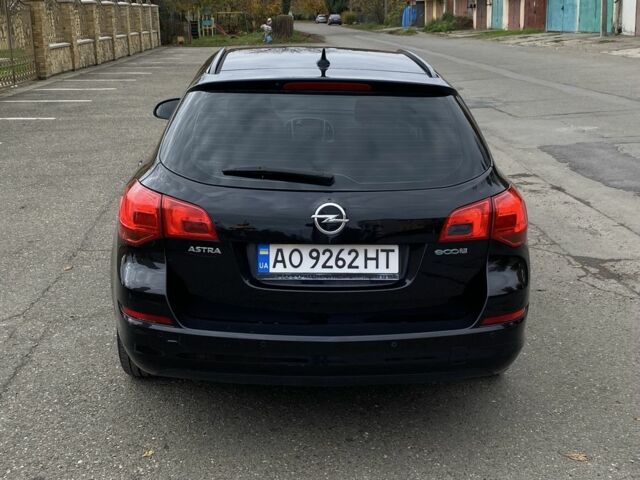Черный Опель Астра, объемом двигателя 1.2 л и пробегом 310 тыс. км за 6800 $, фото 4 на Automoto.ua