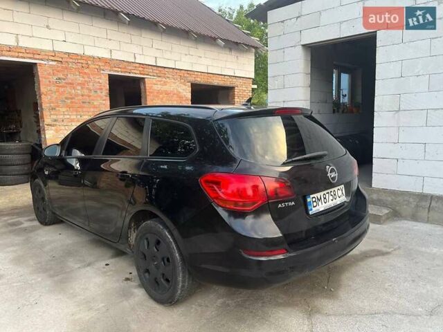 Черный Опель Астра, объемом двигателя 1.7 л и пробегом 231 тыс. км за 5800 $, фото 1 на Automoto.ua