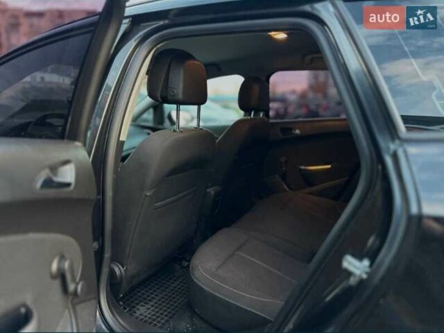 Чорний Опель Астра, об'ємом двигуна 1.4 л та пробігом 253 тис. км за 6000 $, фото 4 на Automoto.ua