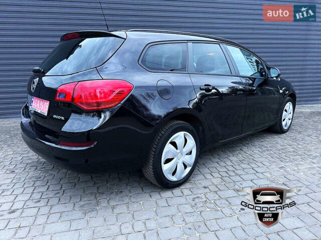 Черный Опель Астра, объемом двигателя 1.4 л и пробегом 180 тыс. км за 7500 $, фото 3 на Automoto.ua