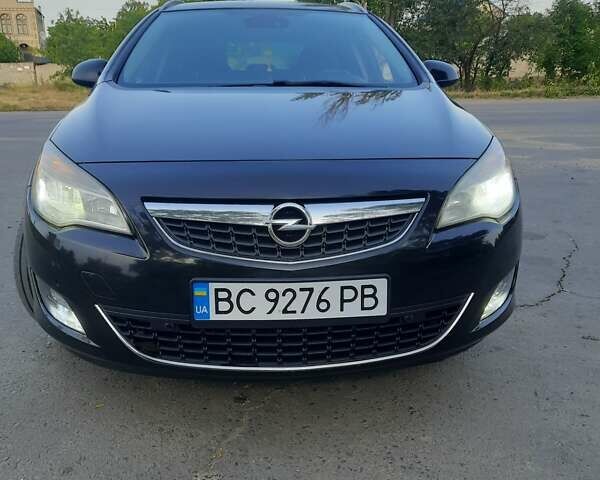 Черный Опель Астра, объемом двигателя 1.69 л и пробегом 340 тыс. км за 6500 $, фото 1 на Automoto.ua